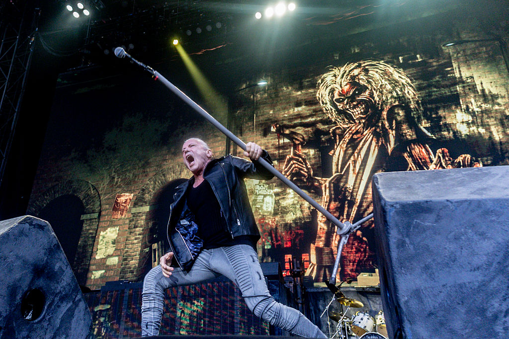 Bruce Dickinson performing before Iron Maiden’s Eddie stage backdrop in Madrid.