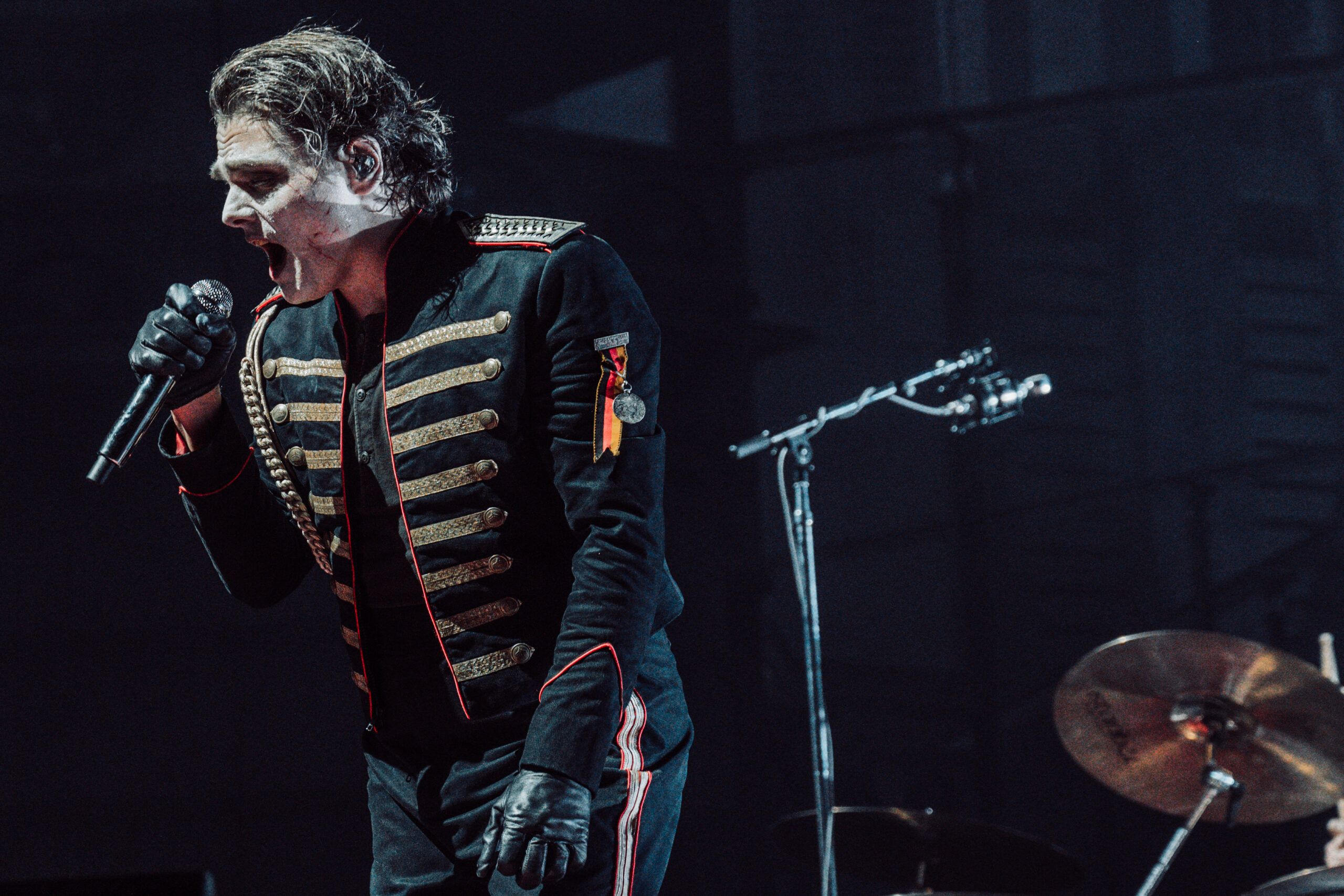 My Chemical Romance vocalist Gerard Way performing on stage.